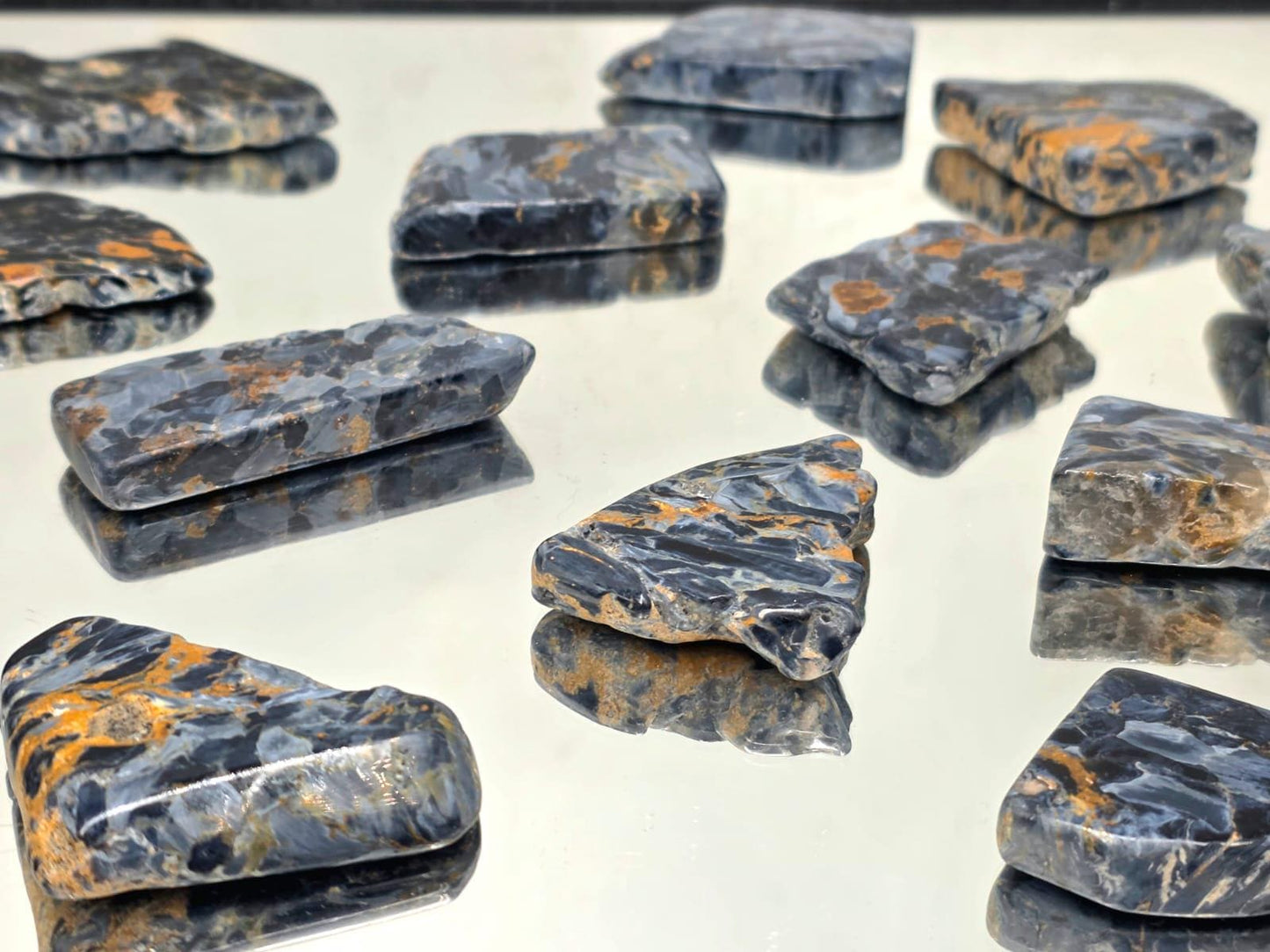 Chatoyant Pietersite slice used for display