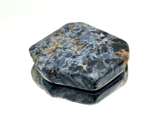 Polished pietersite slice with chatoyant mineral patterns
