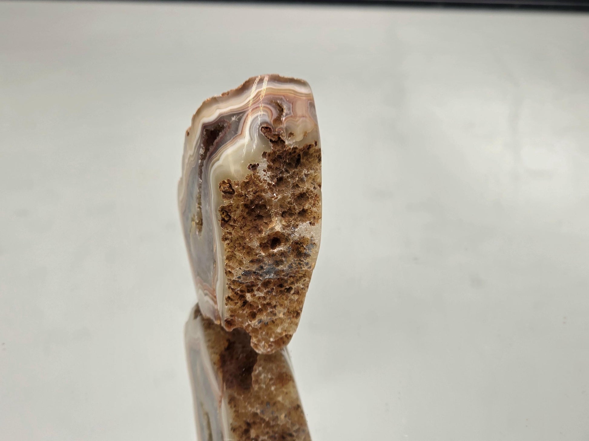 Polished banded Malawi Agate crystal geode.