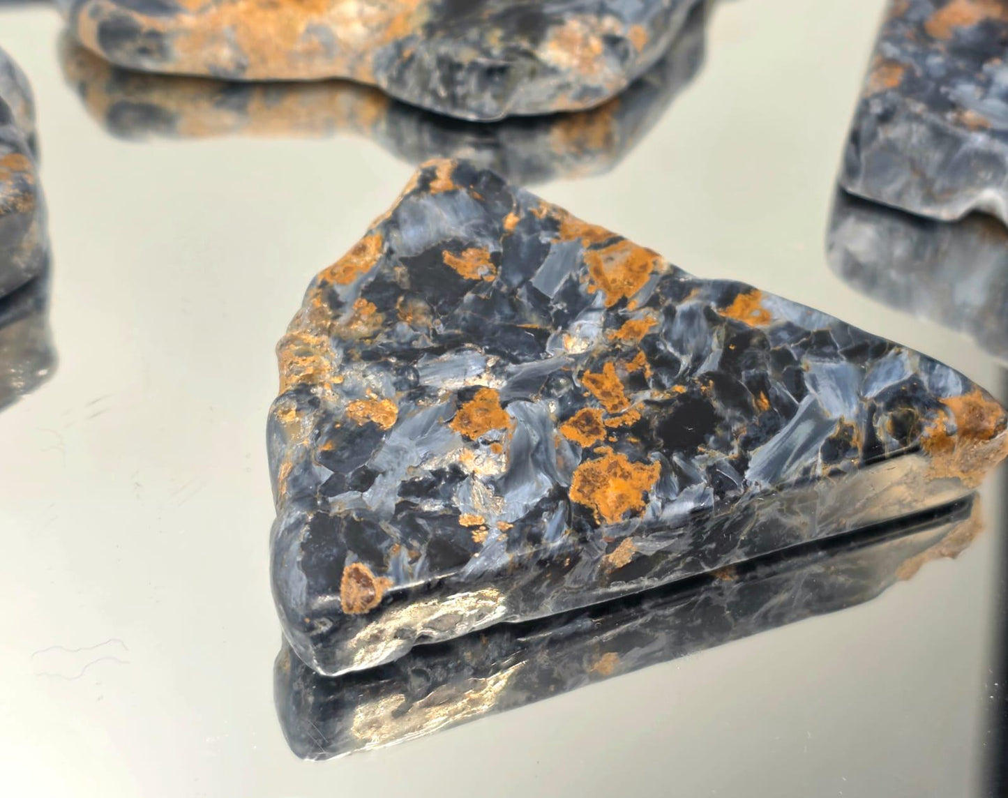 Polished mineral slice showing Pietersite patterns