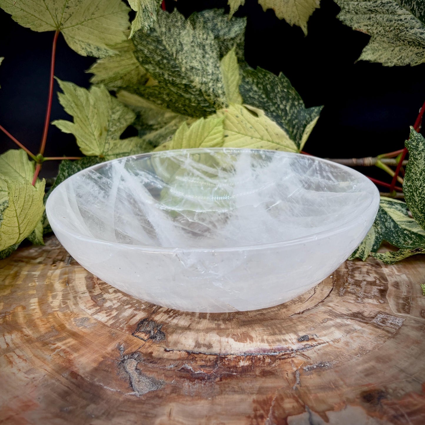 Polished Clear Quartz crystal bowl with natural clarity and inclusions