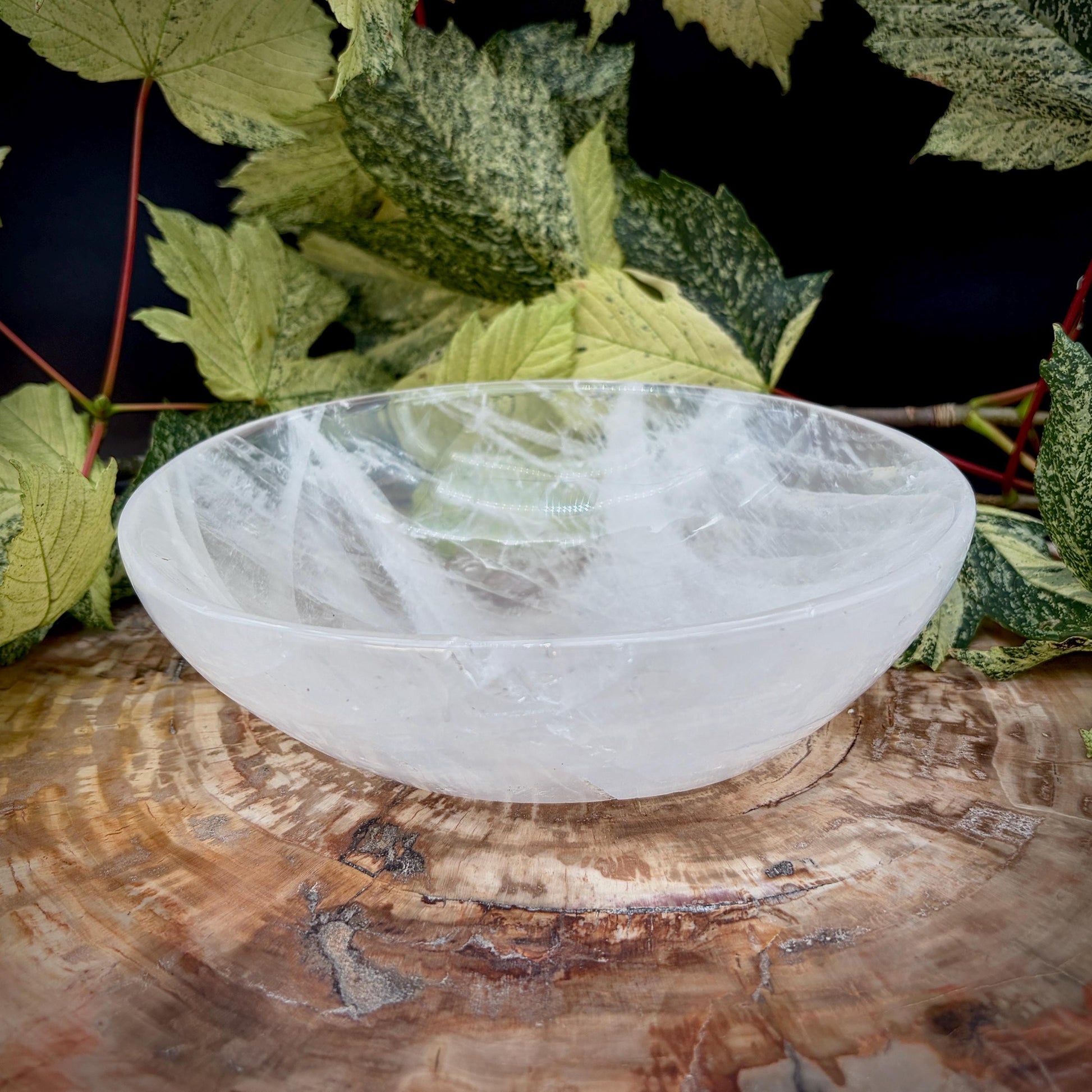 Polished Clear Quartz crystal bowl with natural clarity and inclusions
