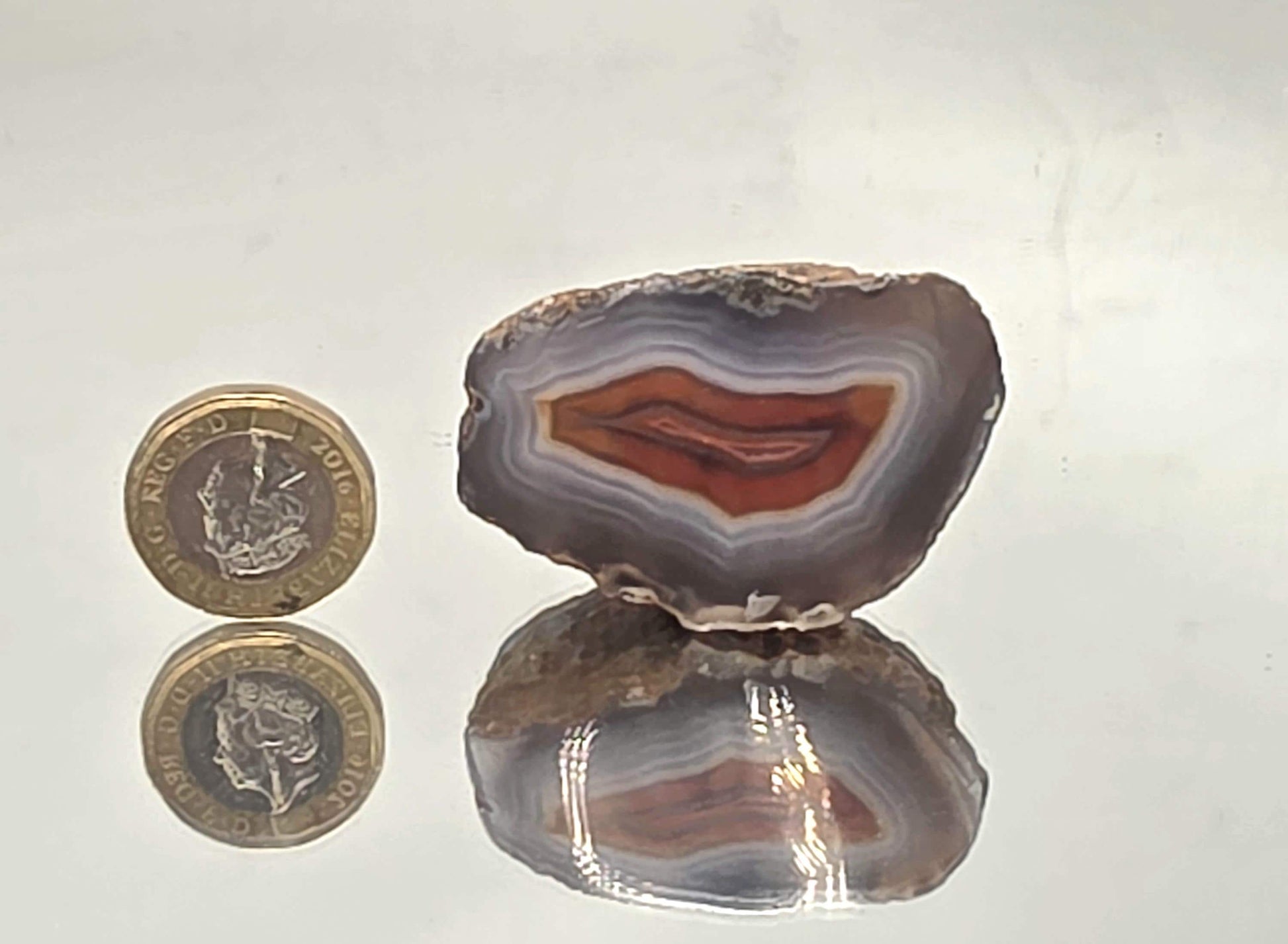 Polished crystal decorative Malawi Agate geode.