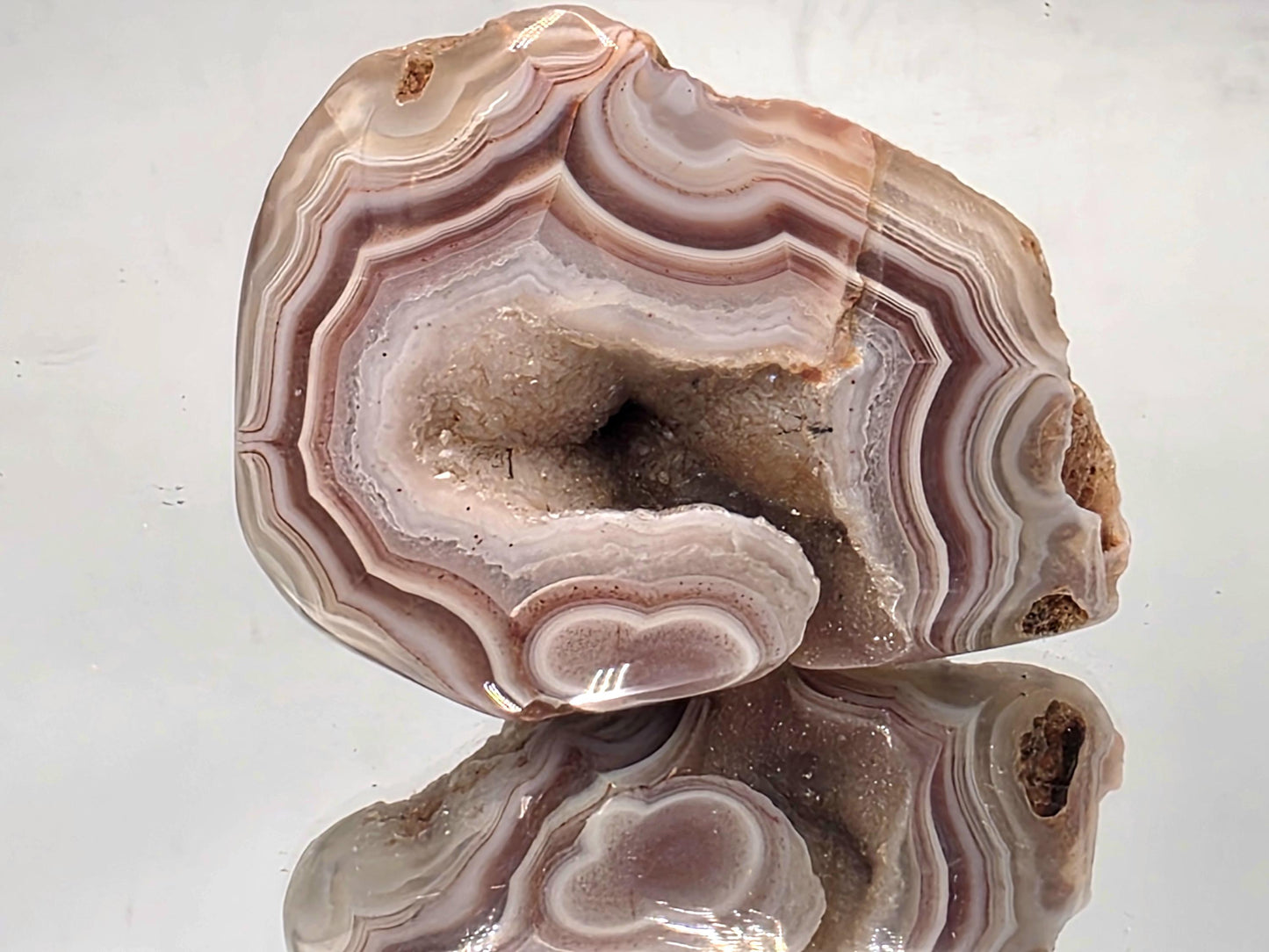 Polished crystal natural Malawi Agate geode.