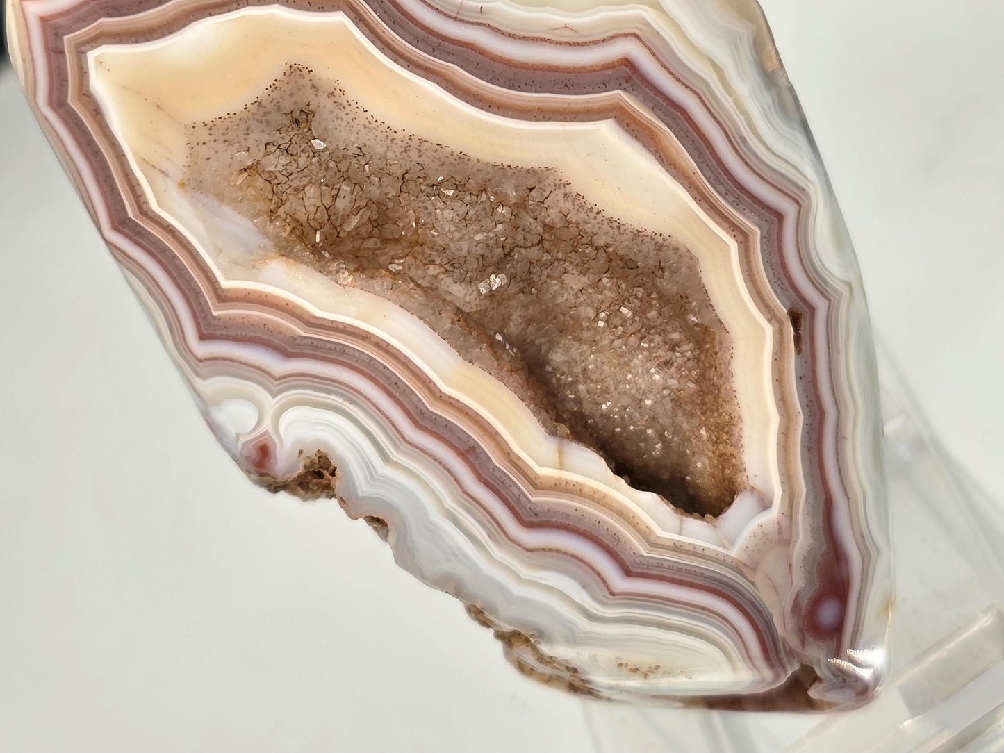 Polished crystal unique Malawi Agate geode.