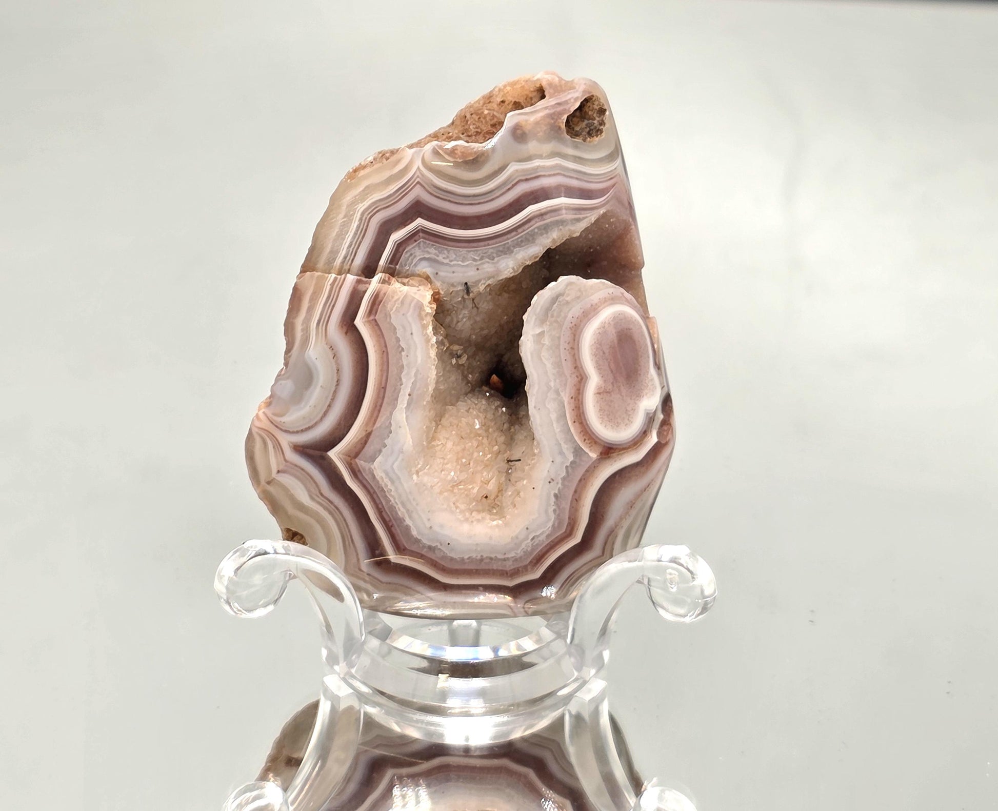 Polished natural banded Malawi Agate crystal.