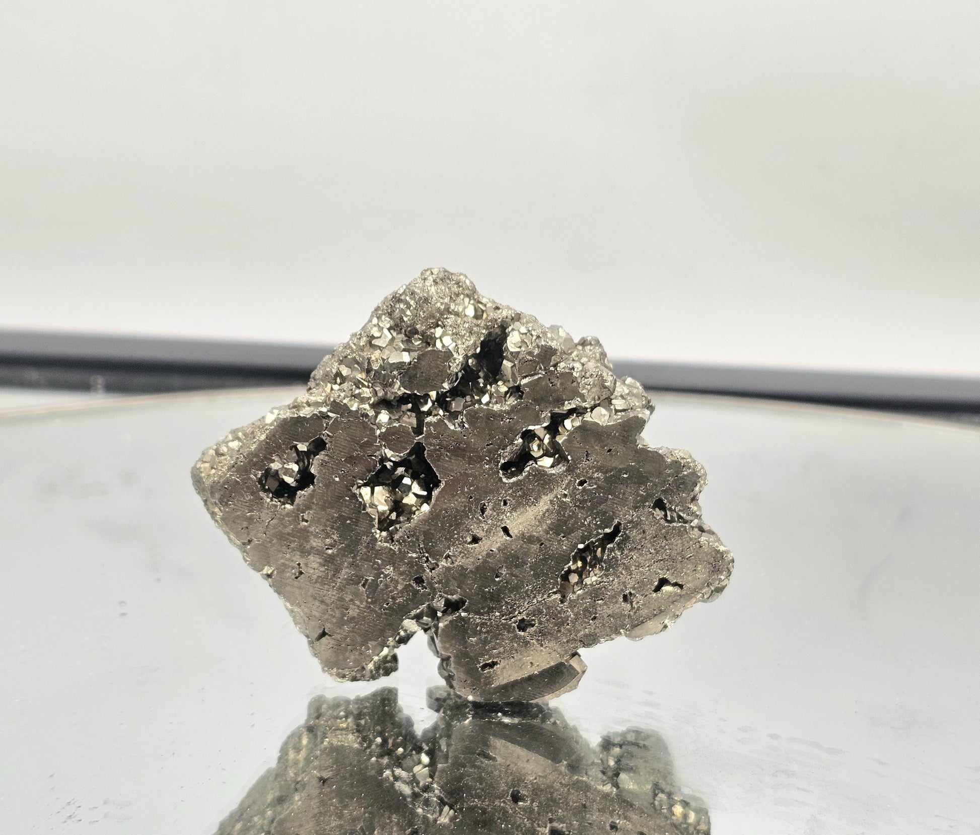 Beautiful polished Pyrite crystal slice with raw edging.