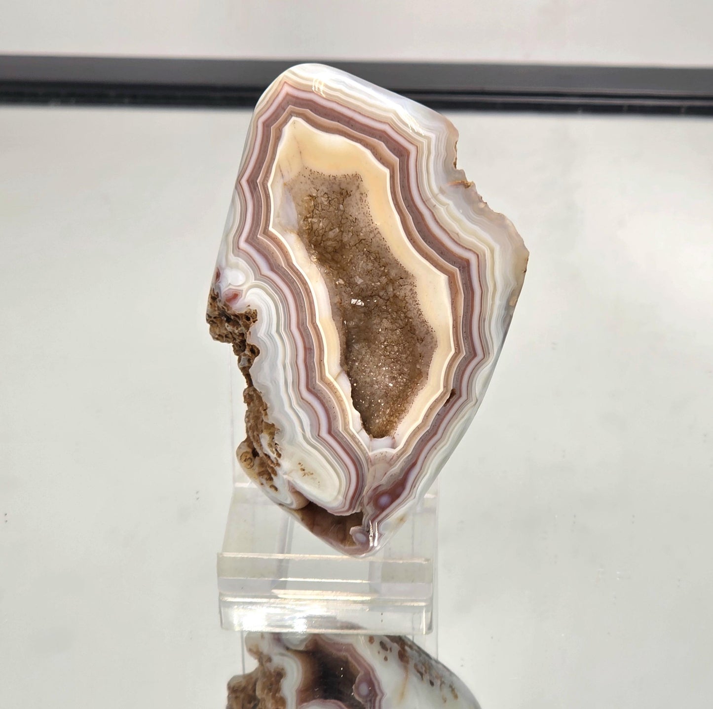 Polished unique Malawi Agate crystal geode.