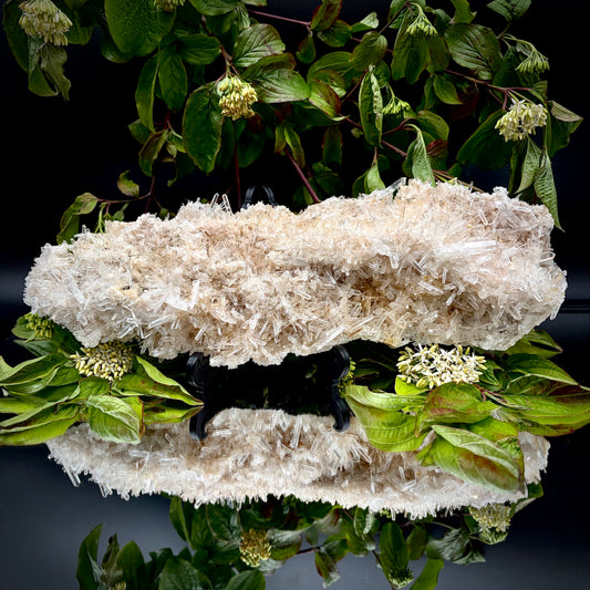 Front view of a premium clear needle quartz showpiece highlighting its sculptural shape and lustre.