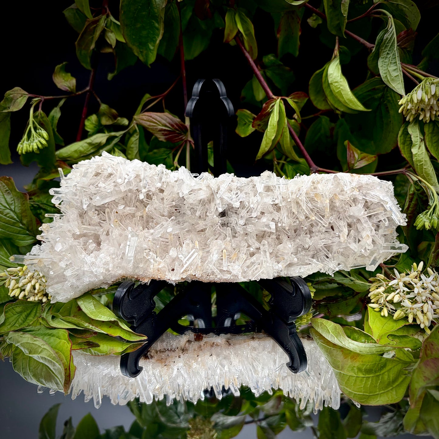 Front view of a premium clear needle quartz showpiece highlighting its sculptural shape and lustre.