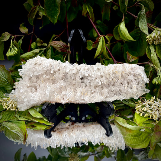 Front view of a premium clear needle quartz showpiece highlighting its sculptural shape and lustre.