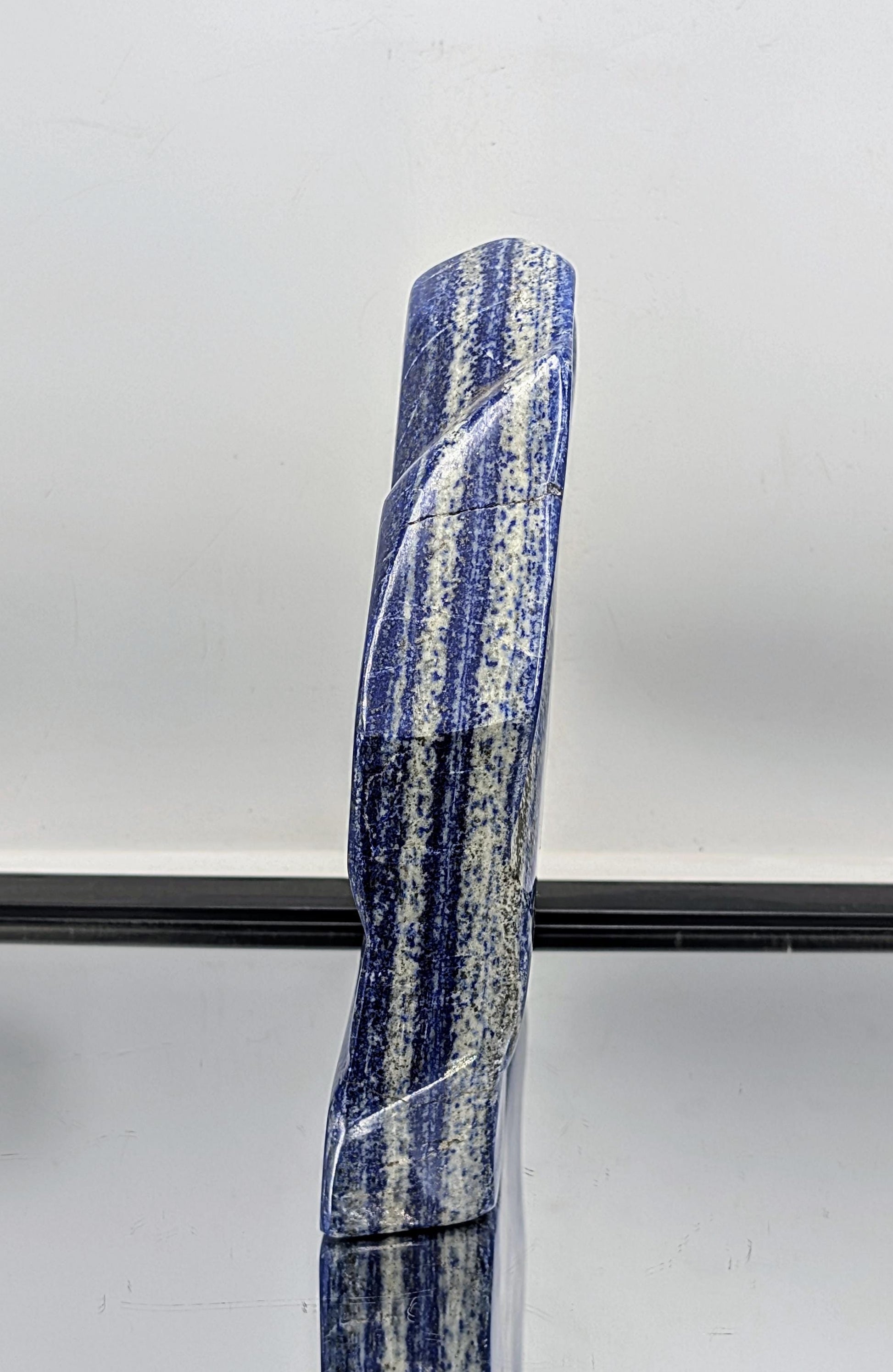 Premium natural Lapis Lazuli gemstone with deep blue tones.
