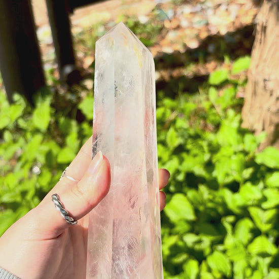 Quartz crystal prism styled for sideboard decor, modern interiors and natural decorative displays.