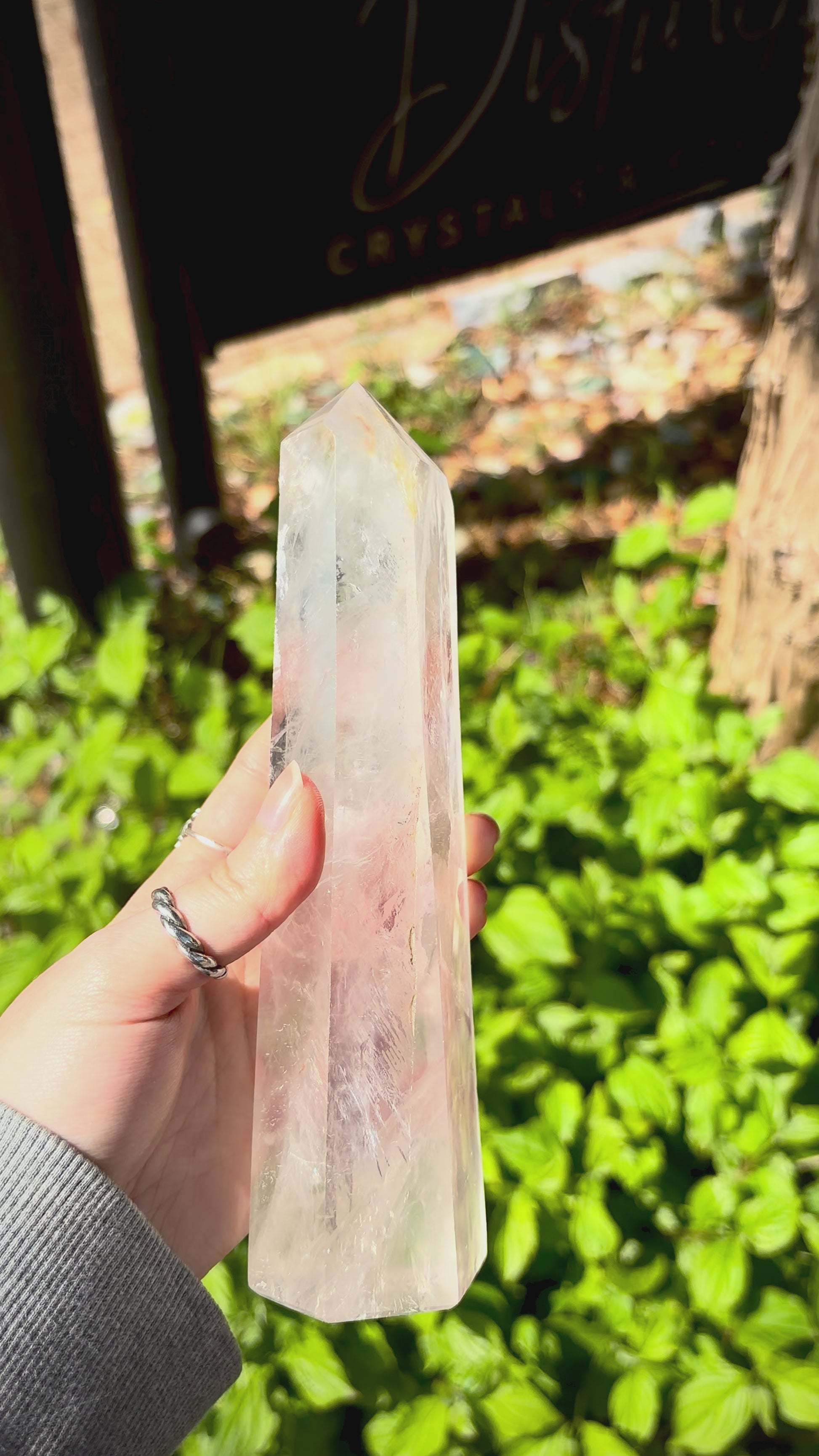 Quartz crystal prism styled for sideboard decor, modern interiors and natural decorative displays.
