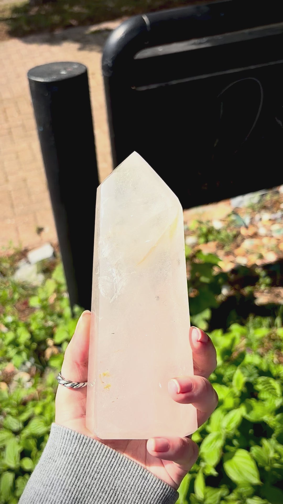 Clear quartz prism for natural home styling, with internal texture and elegant sculptural form.