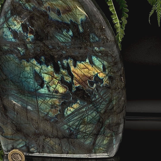 video of and polished labradorite freeform from Madagascar with natural mineral structure and display appeal.