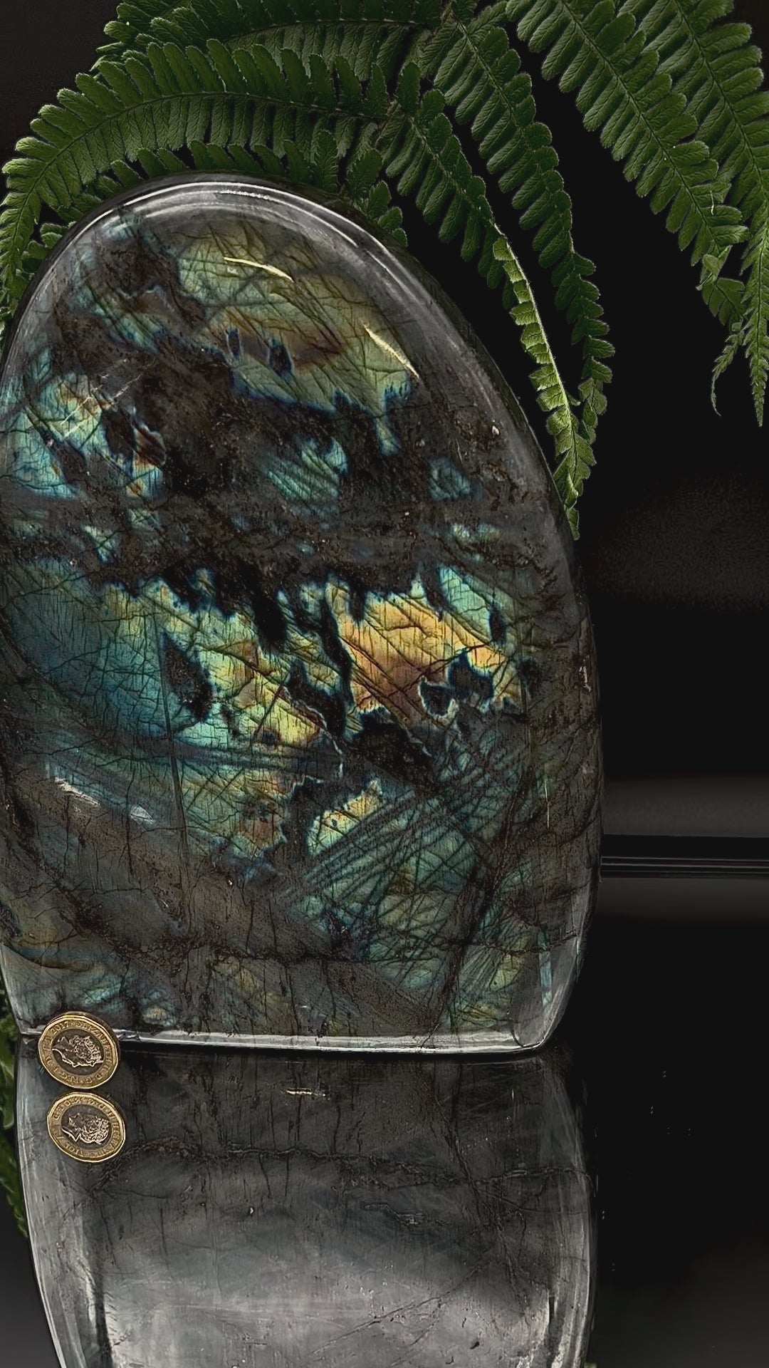 video of and polished labradorite freeform from Madagascar with natural mineral structure and display appeal.