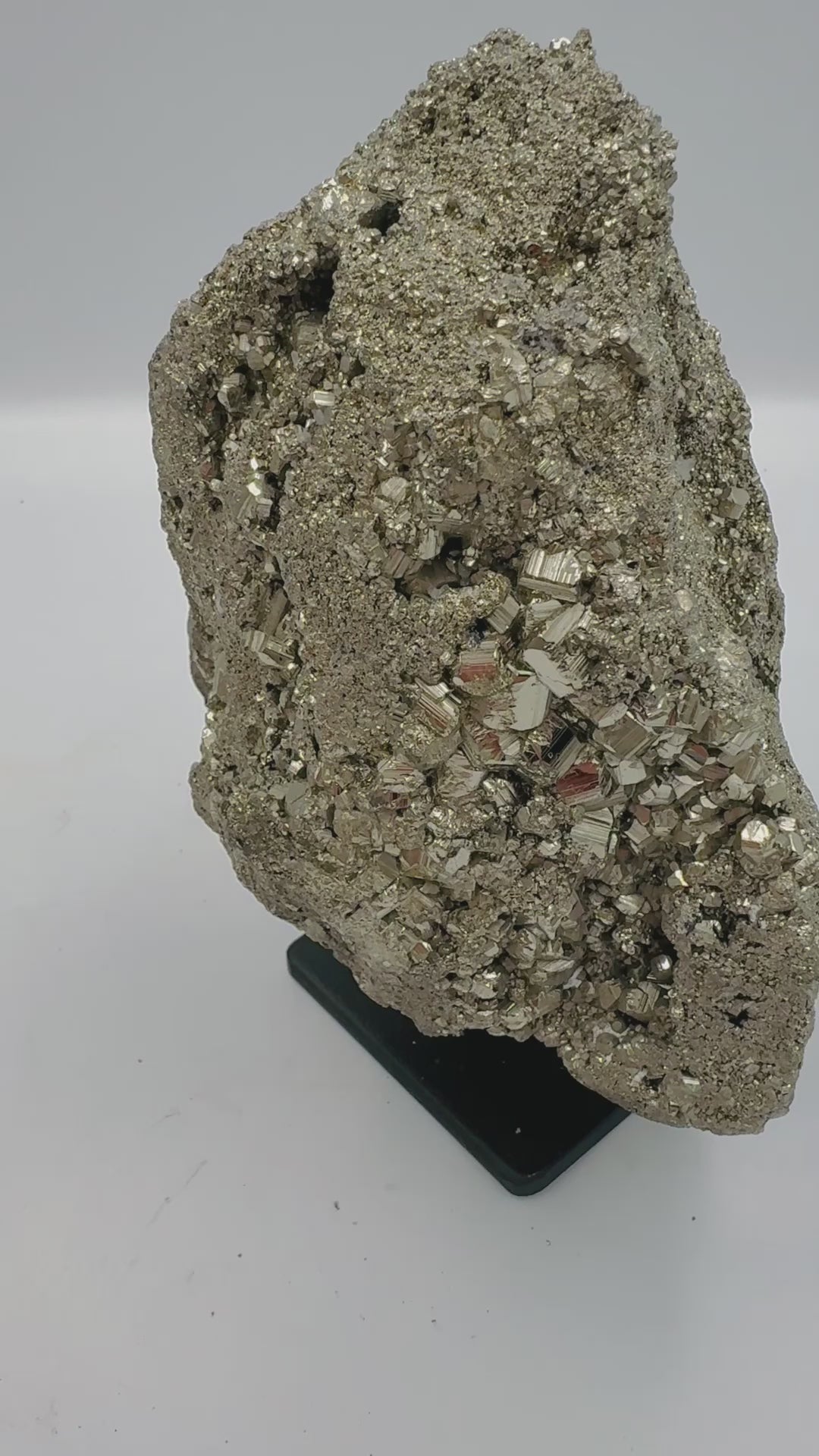 video of pyrite crystal on display stand interior design