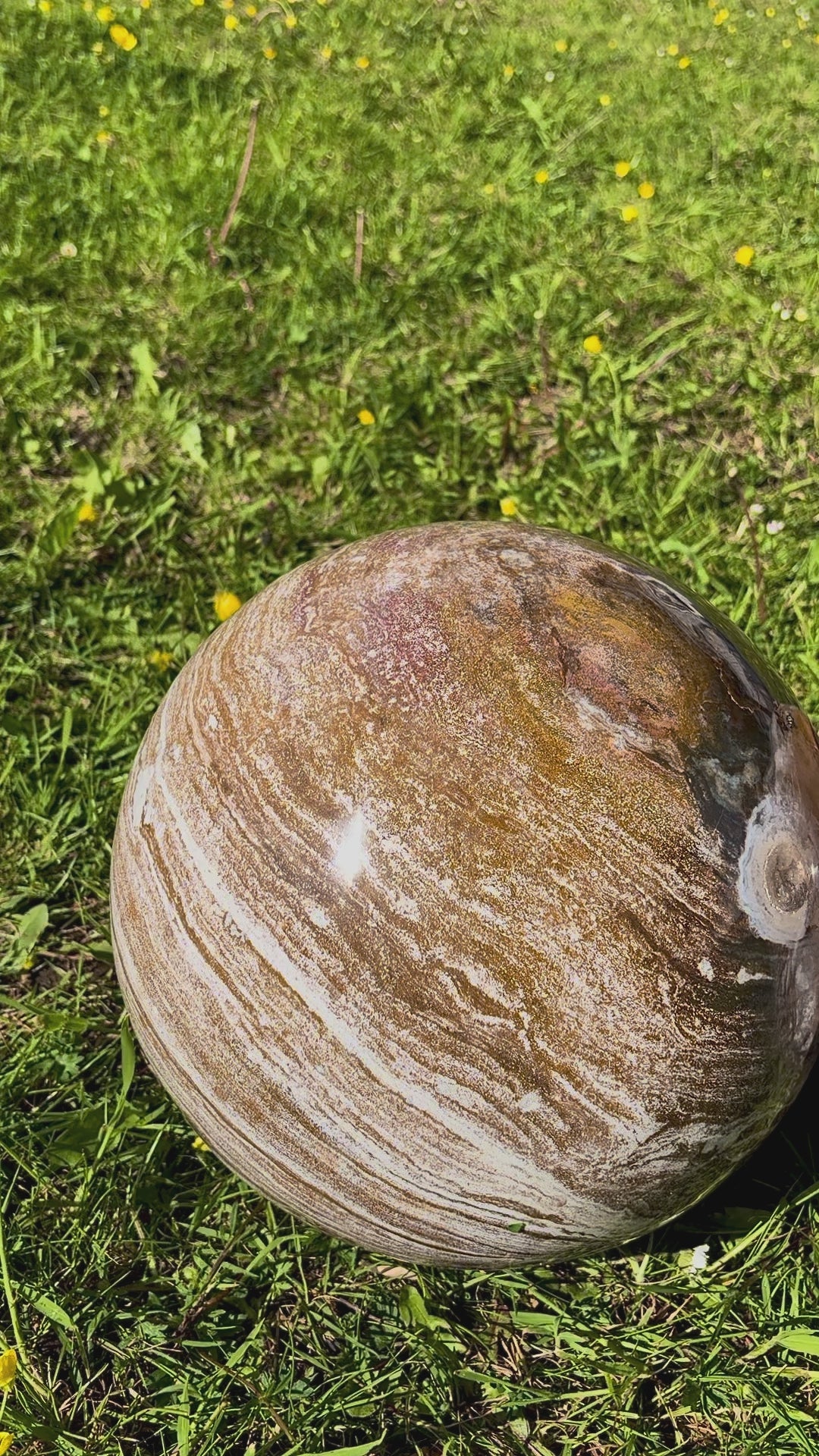 Video showcasing the 360-degree patterns and sparkling druse pocket of the Ocean Jasper spheres.
