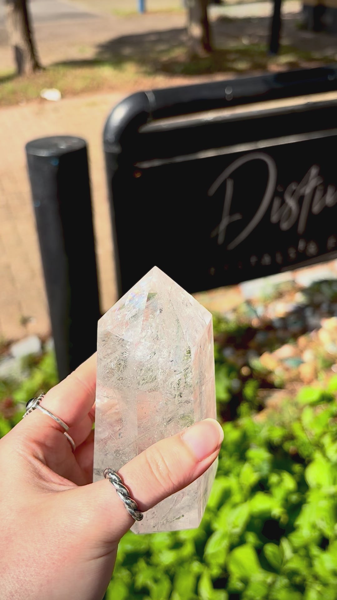 Large polished quartz crystal point from Madagascar with refined shape and natural mineral detail.