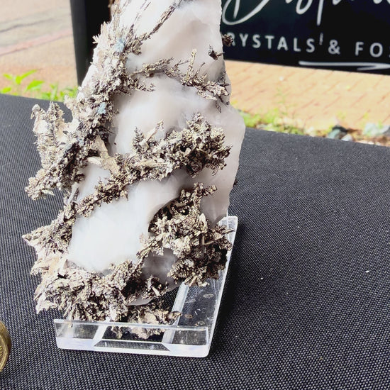 Video panning across Native Silver to show its shimmering, light-reflecting metallic lustre.