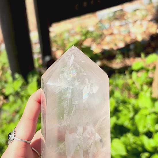 video of quartz crystal tower with rainbow