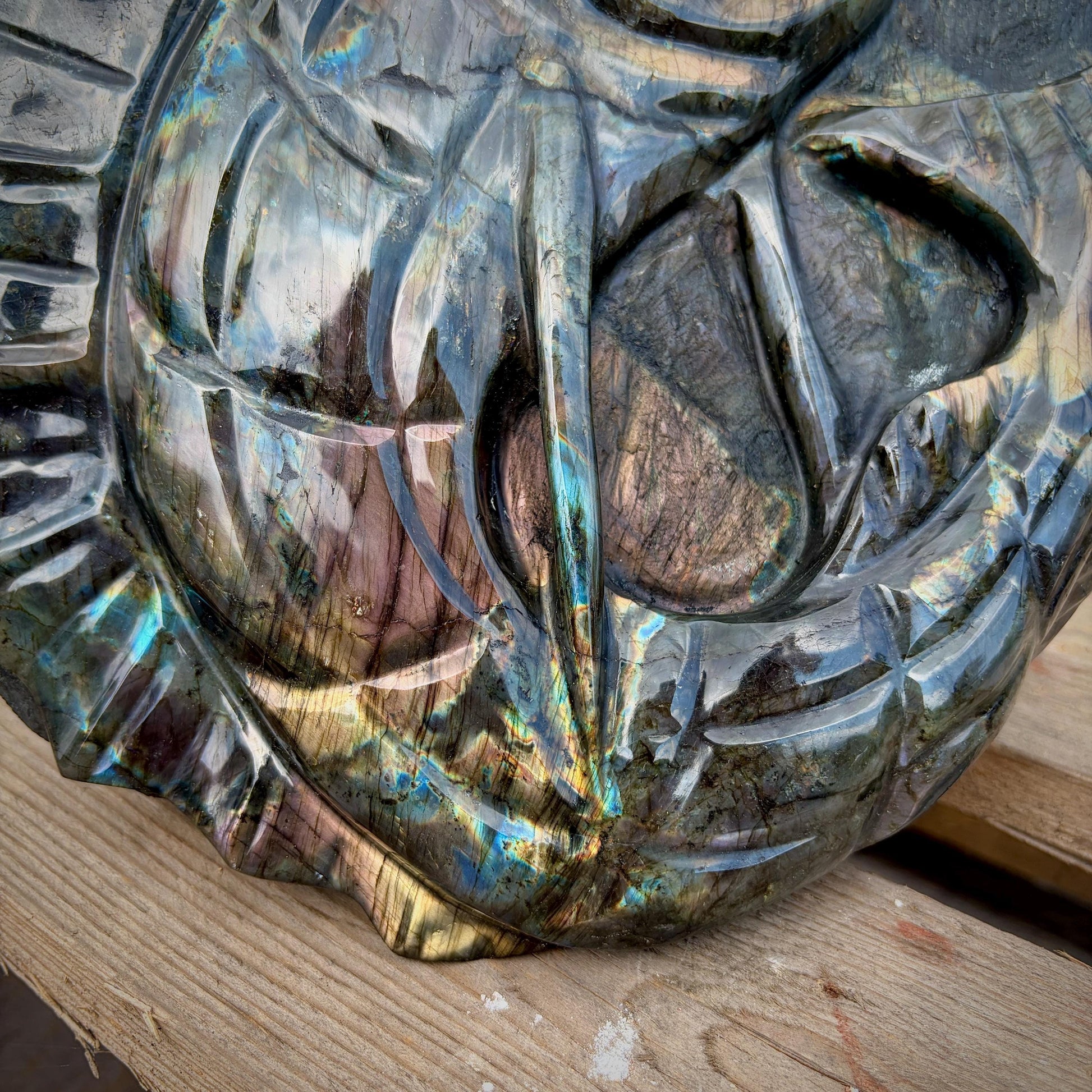 Natural Madagascan Labradorite fish carving with vibrant labradorescence