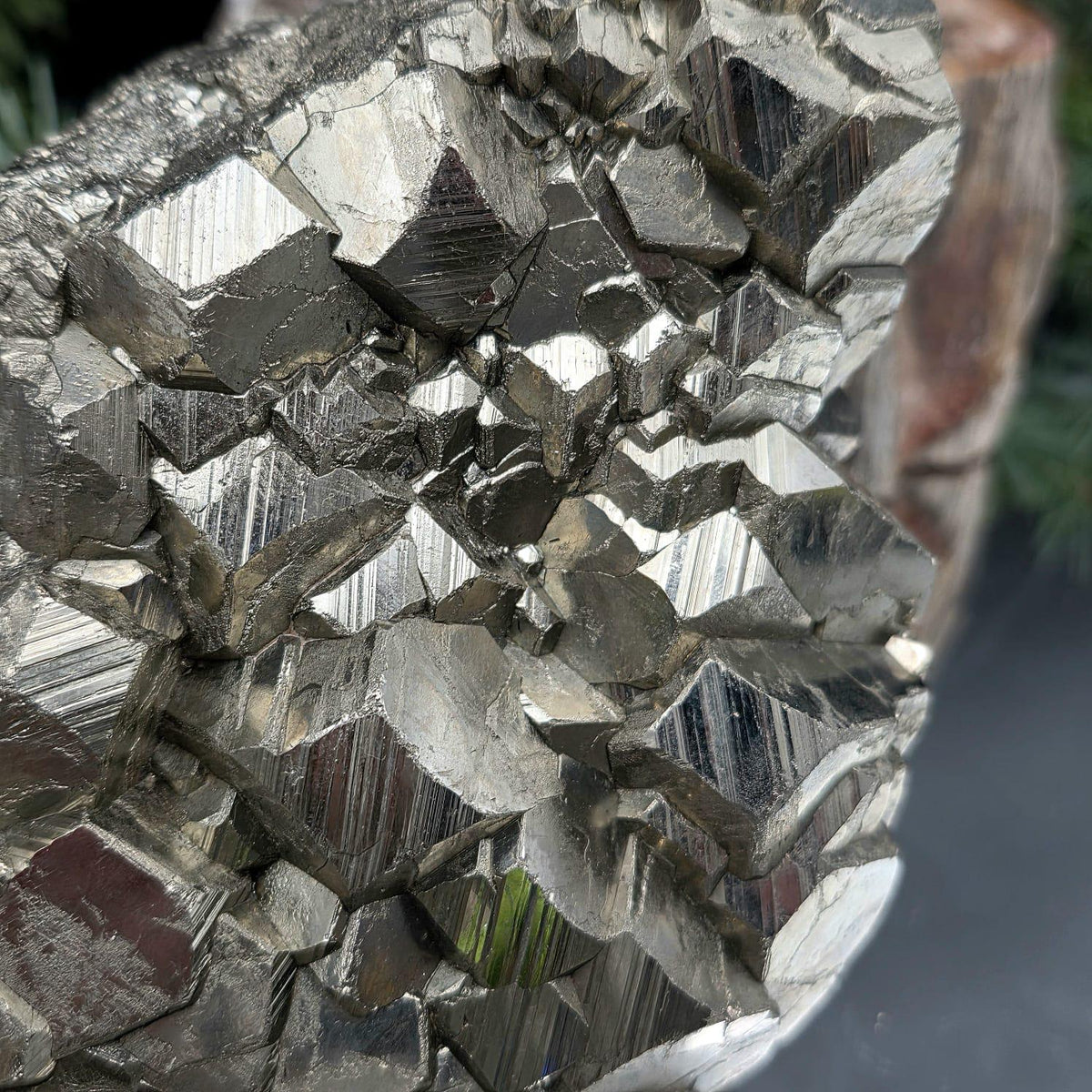 Natural Pyrite mineral specimen featuring distinctive geometric crystal formations.