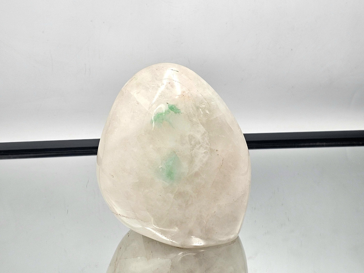 Rare Quartz crystal with Green Fuchsite inclusion from Madagascar, showcasing the natural beauty and color of the inclusions.