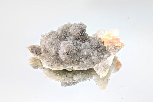 Quartz on Fluorite crystal with UV fluorescence, perfect for collectors.