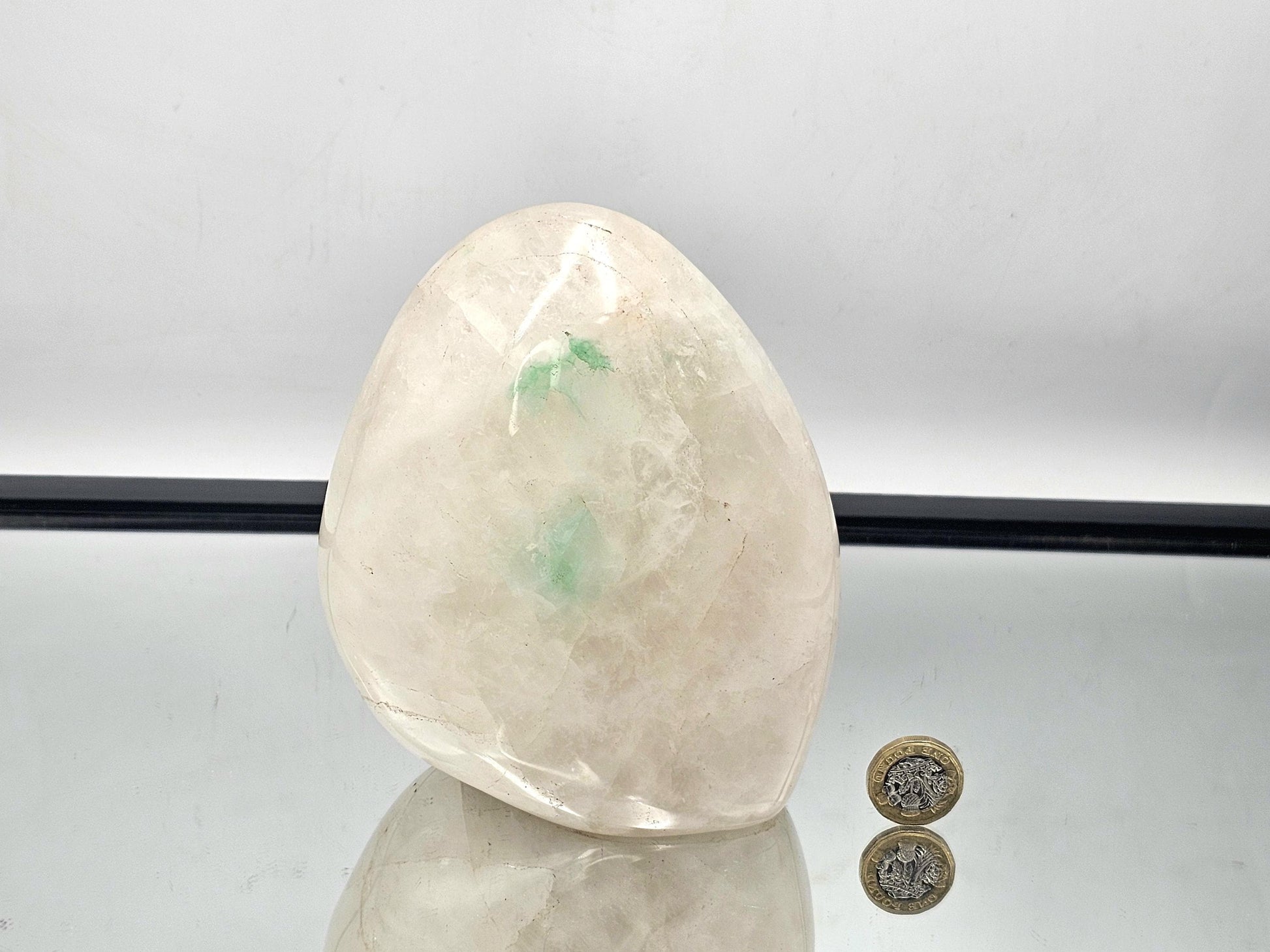  Quartz crystal with Green Fuchsite inclusion, illuminated to reveal the natural beauty of the crystal and inclusions.