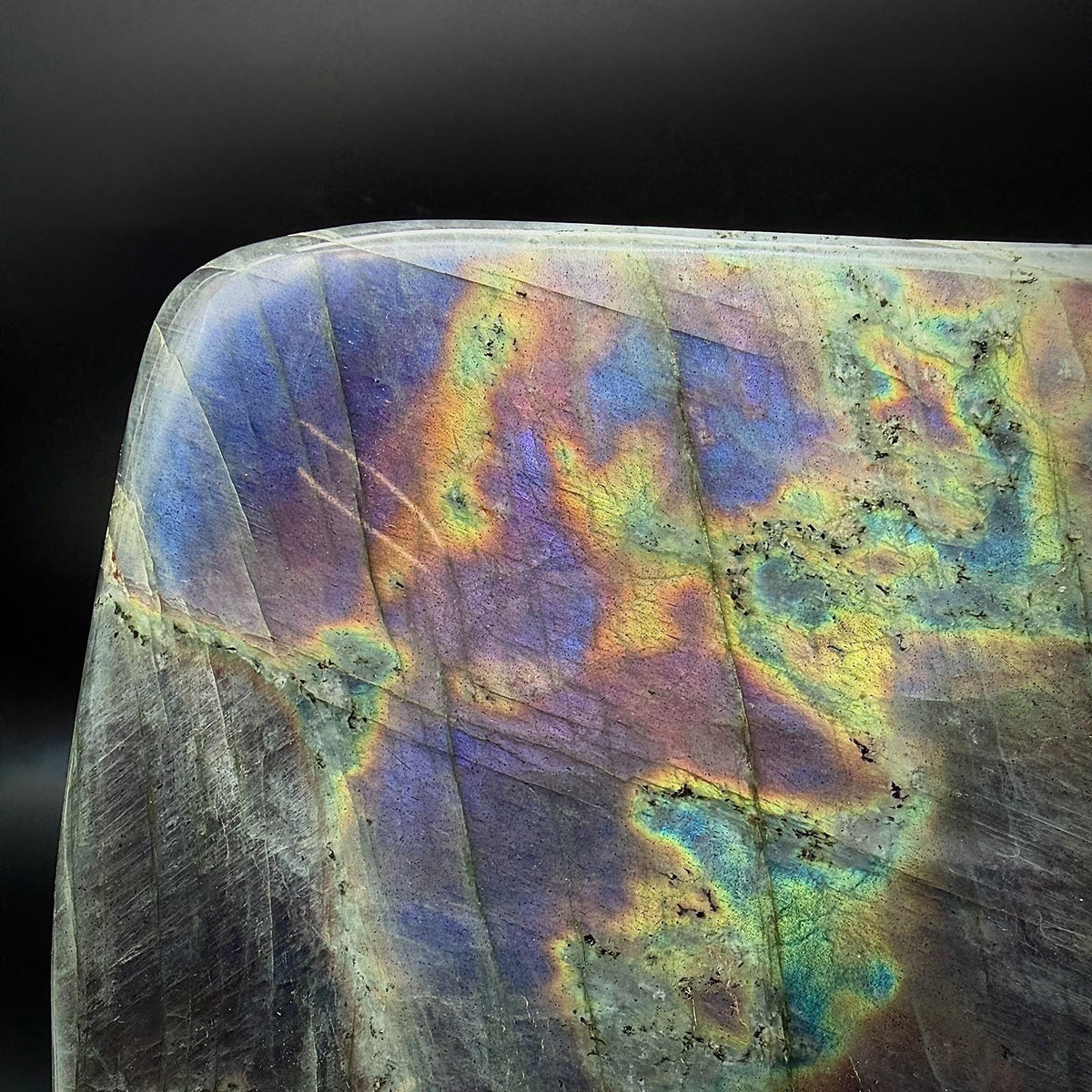 Madagascan Labradorite freeform showing purple, blue, teal, gold and warm orange labradorescence.