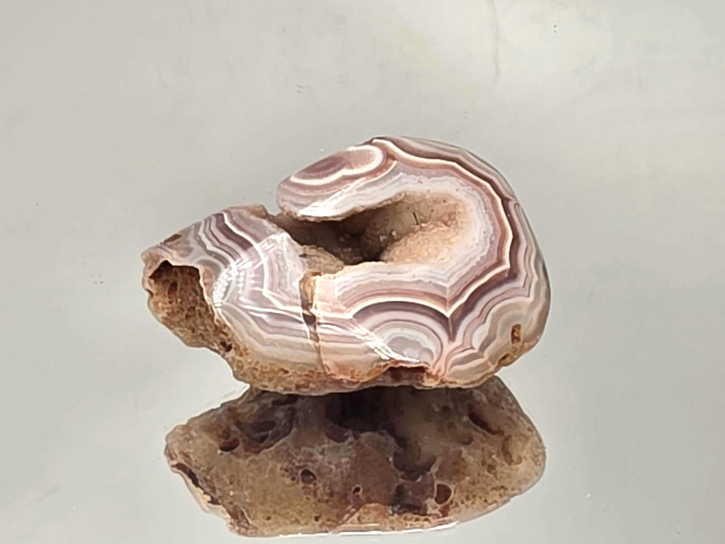 Rare natural Malawi Agate polished geode.