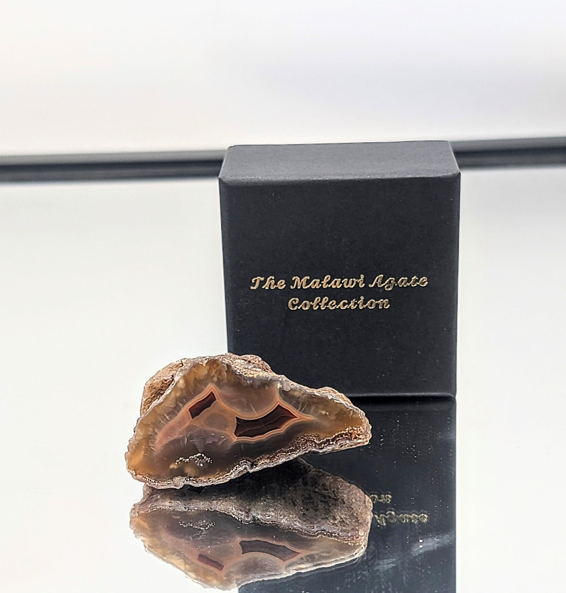 Rare small Malawi Agate stones, highly sought after for their quality and vibrant hues.