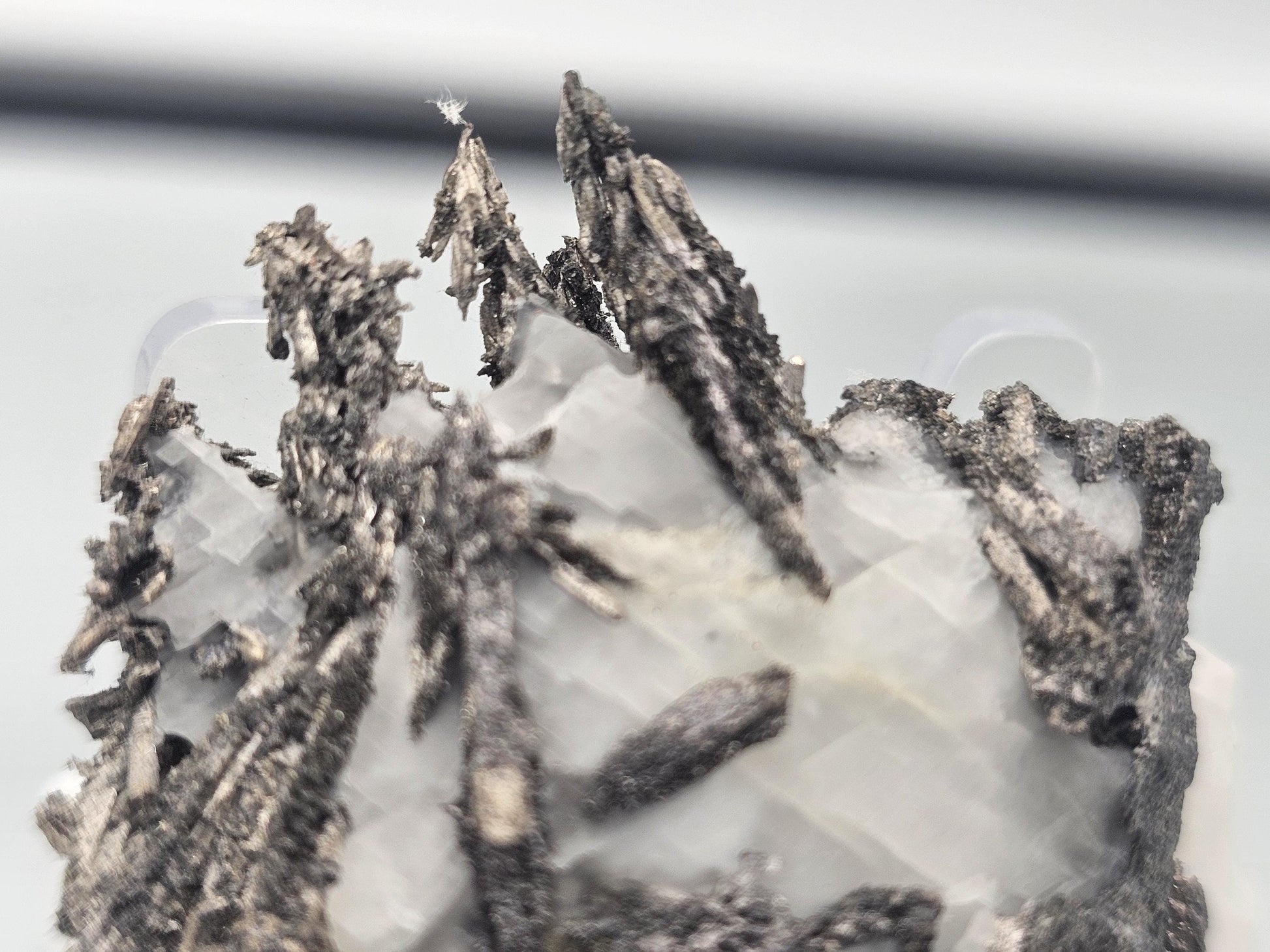 Raw Native Silver on Calcite Matrix integrated into contemporary decor.