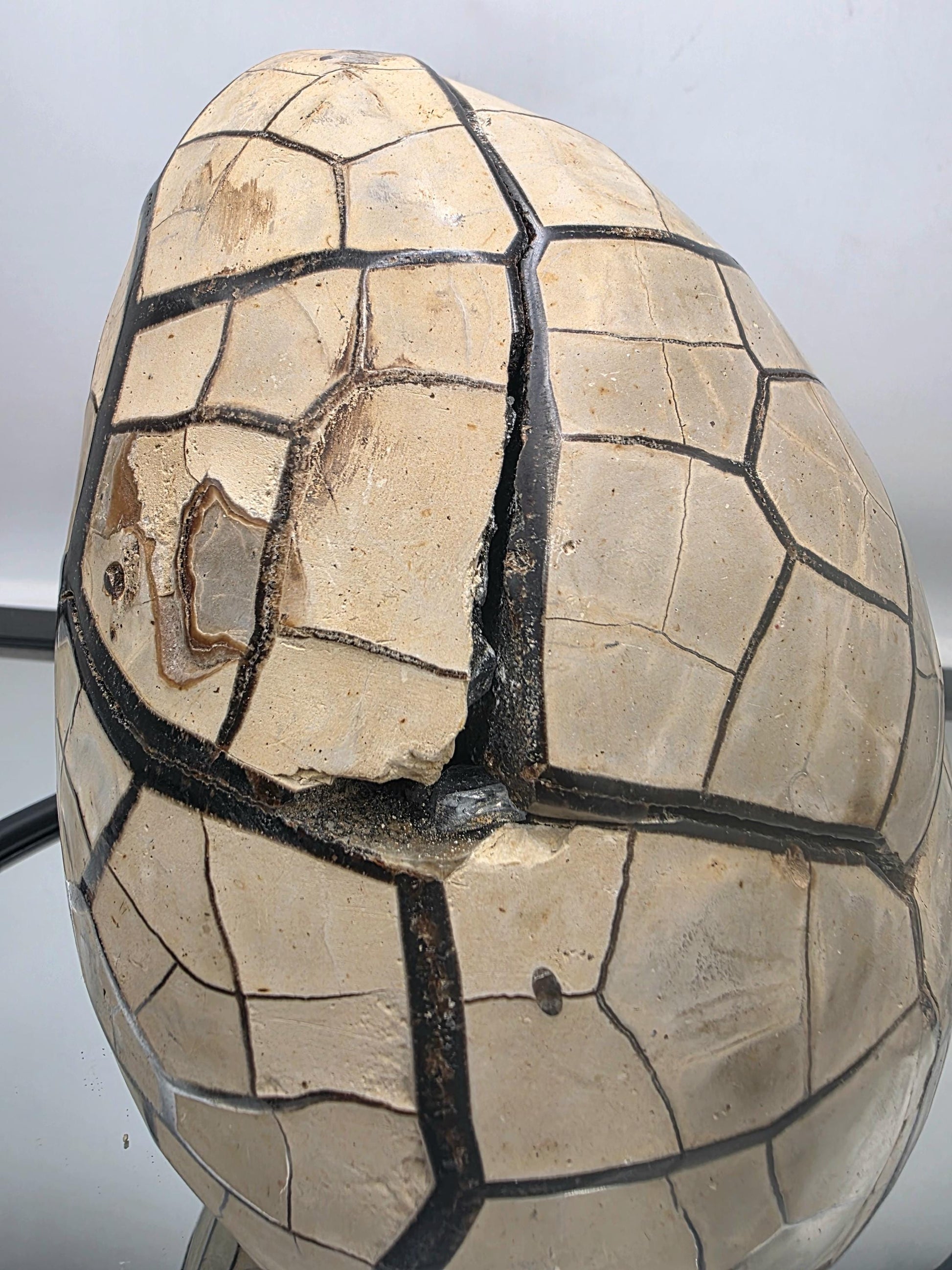 Septarian crystal egg with detachable face section.