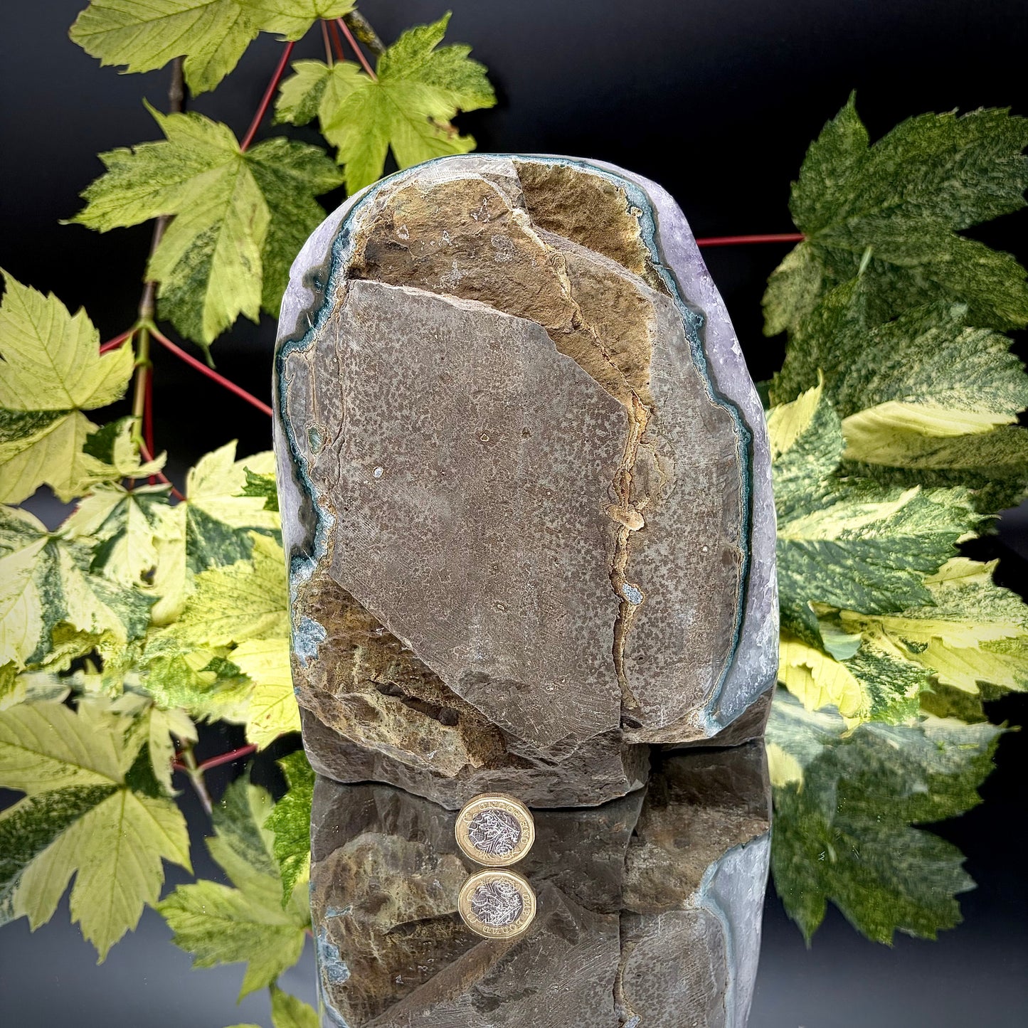 Reverse side of a Uruguayan amethyst crystal freeform showing the matrix and mineral formation.