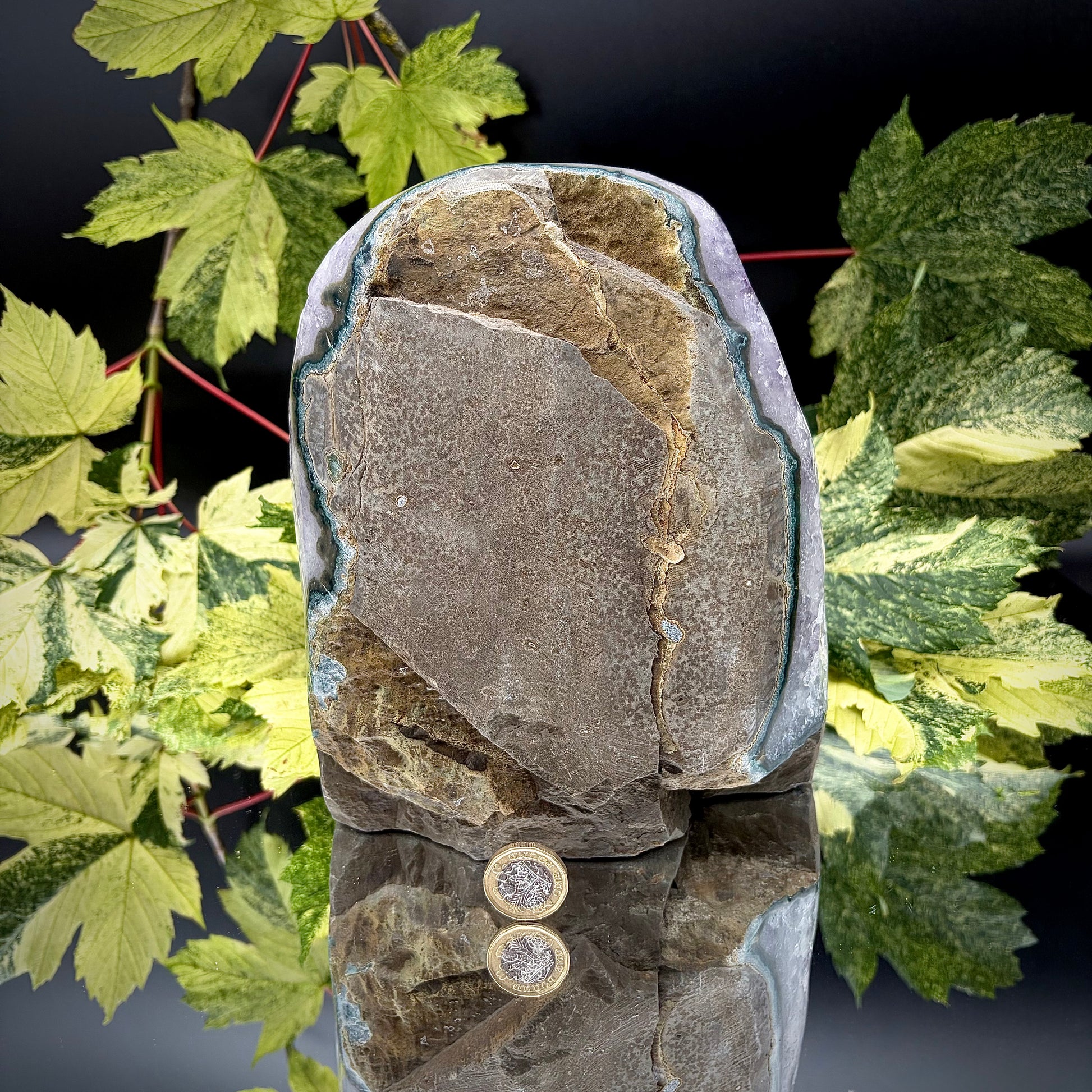 Reverse side of a Uruguayan amethyst crystal freeform showing the matrix and mineral formation.