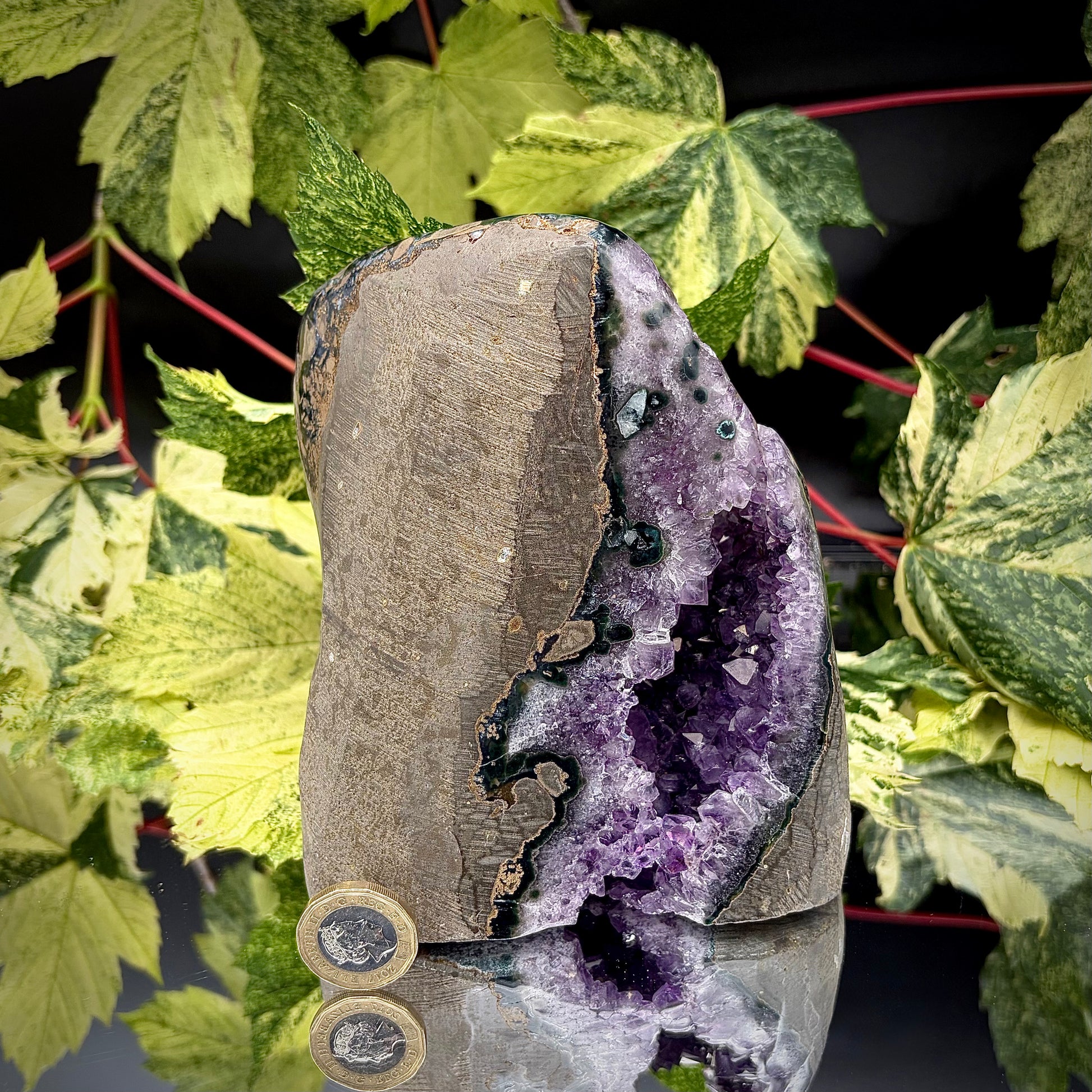 Reverse side of a Uruguayan amethyst crystal freeform showing the matrix and mineral formation.