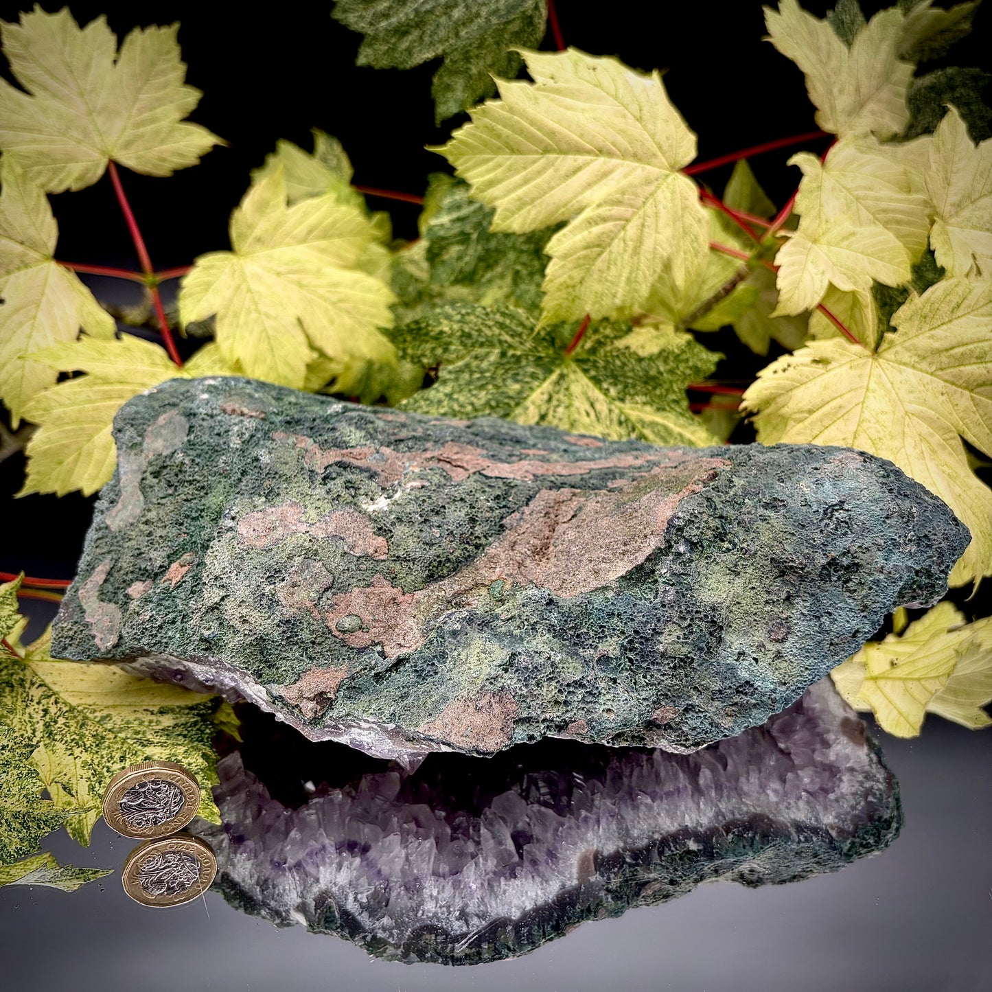 Reverse side of a natural amethyst crystal cluster showing the matrix and mineral formation.