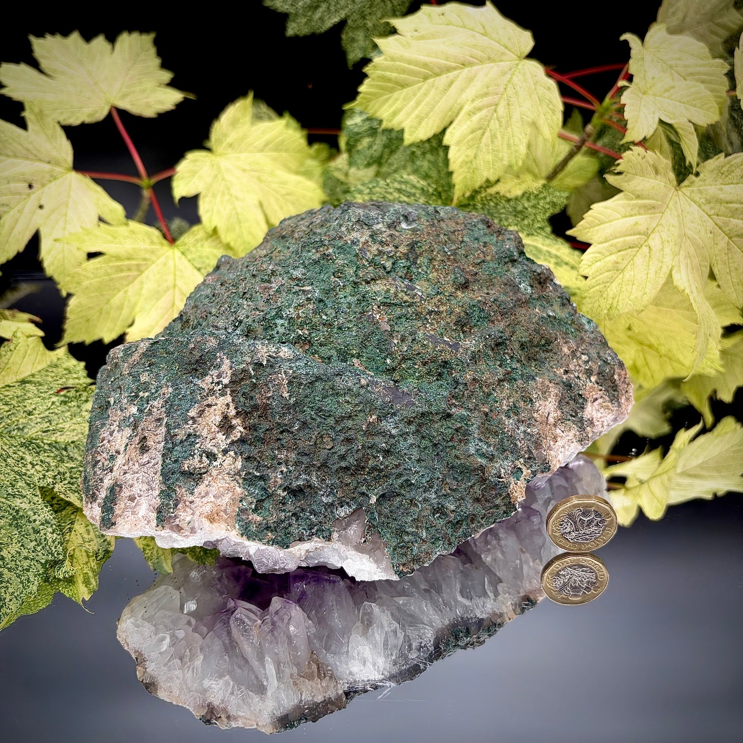 Reverse side of a natural amethyst crystal cluster showing the matrix and mineral formation.
