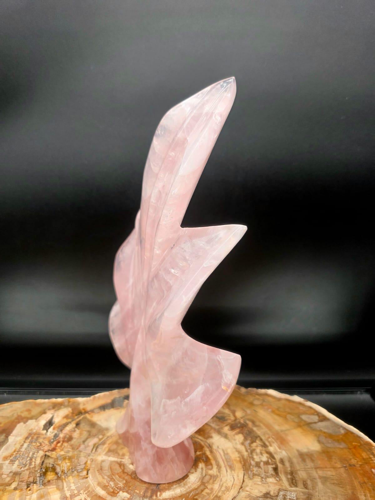 Detailed view of the natural translucency and blush pink tones of genuine Rose Quartz.