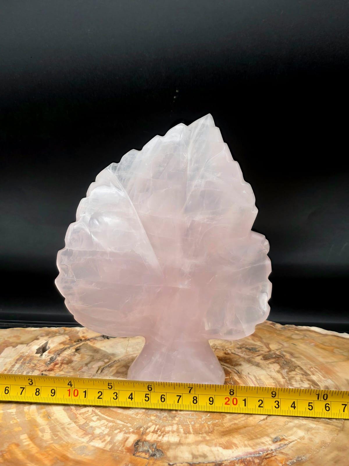 Freestanding Rose Quartz crystal display for interior styling.