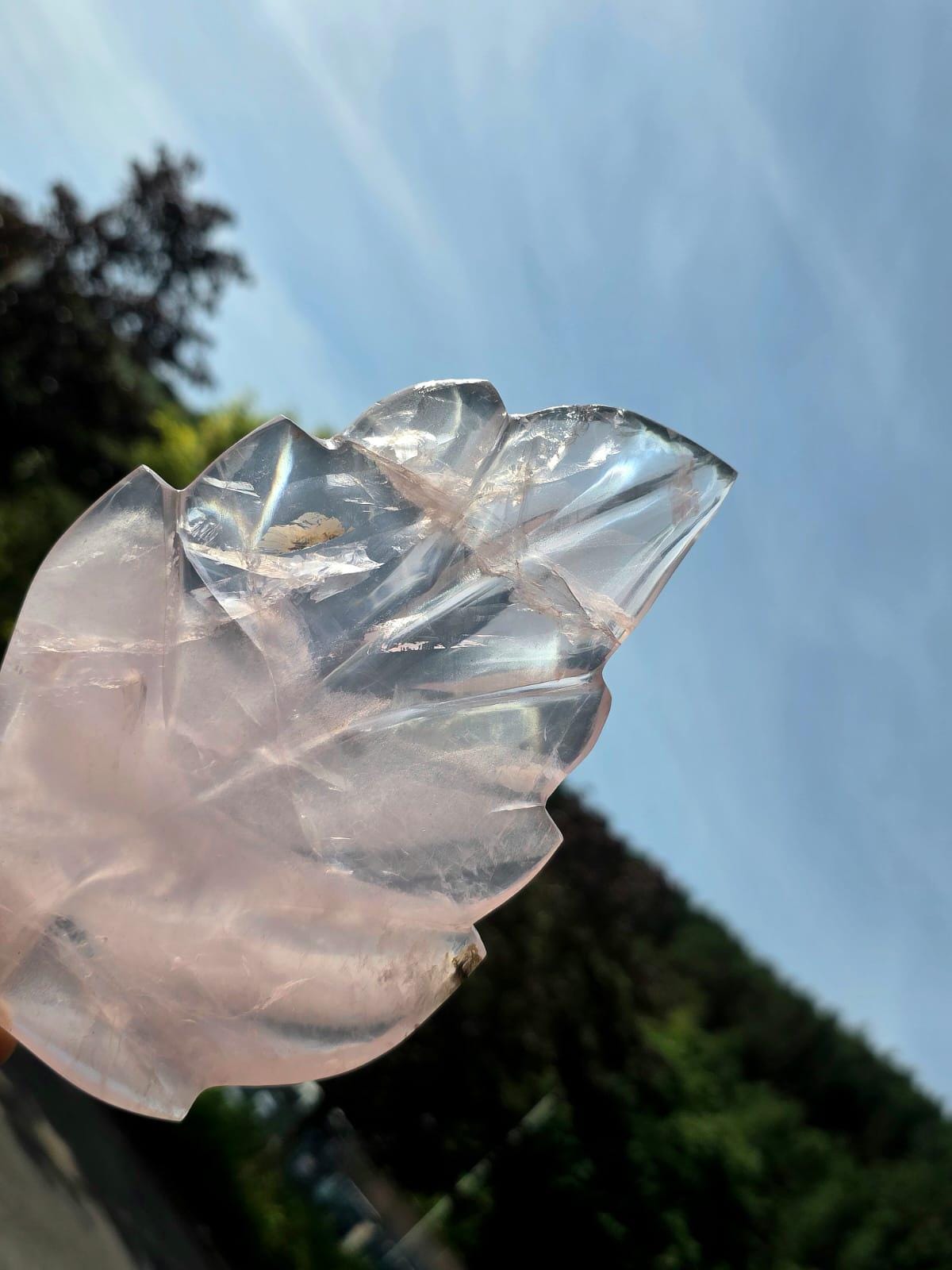 Decorative Rose Quartz crystal leaf for luxury interiors.