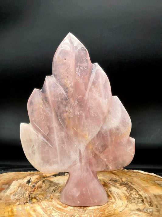 Hand-carved Rose Quartz crystal leaf sculpture with soft blush pink tones from Madagascar.