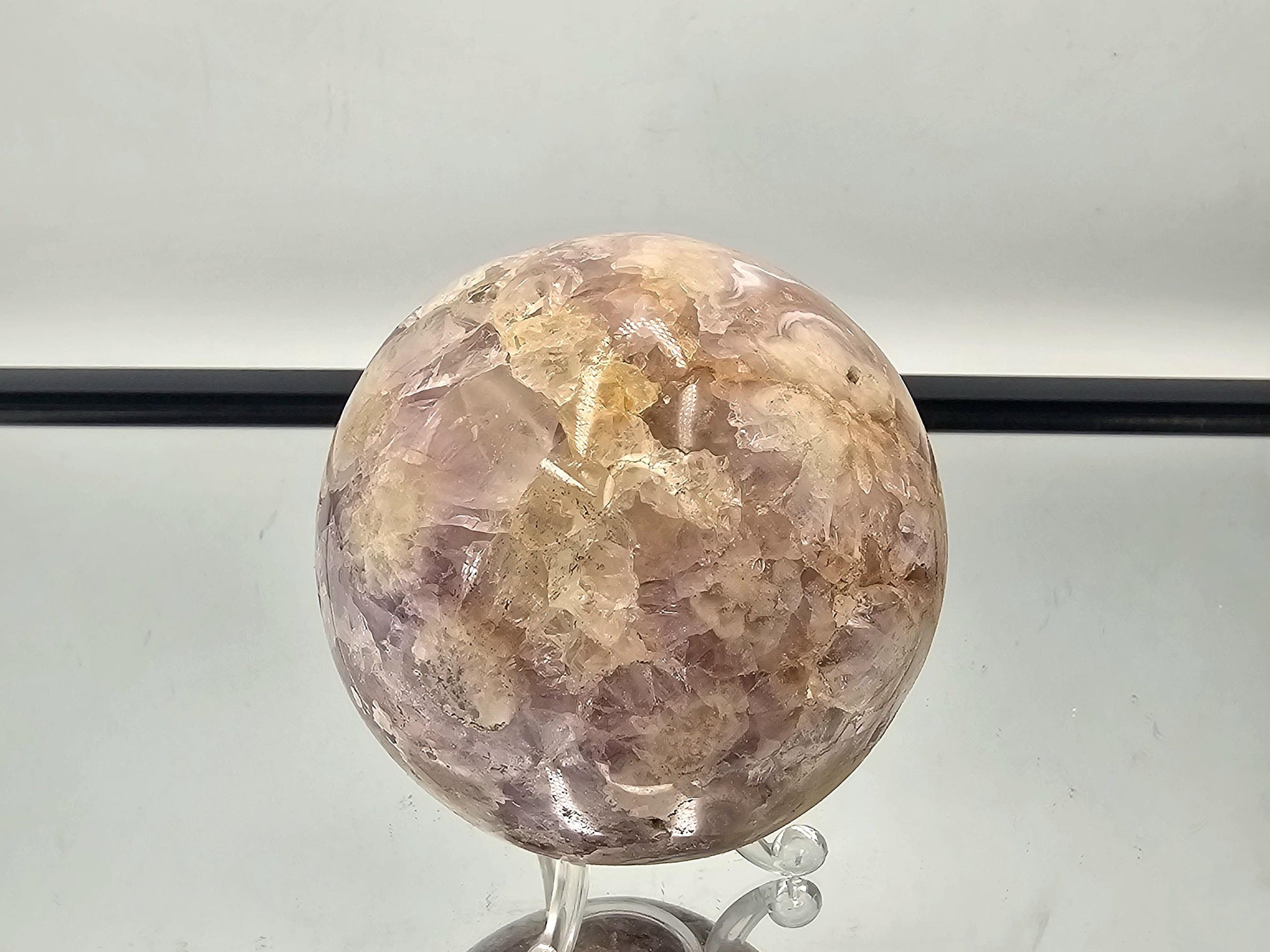 Collector's item: Sakura Agate and Amethyst sphere with exceptional detail and beauty.