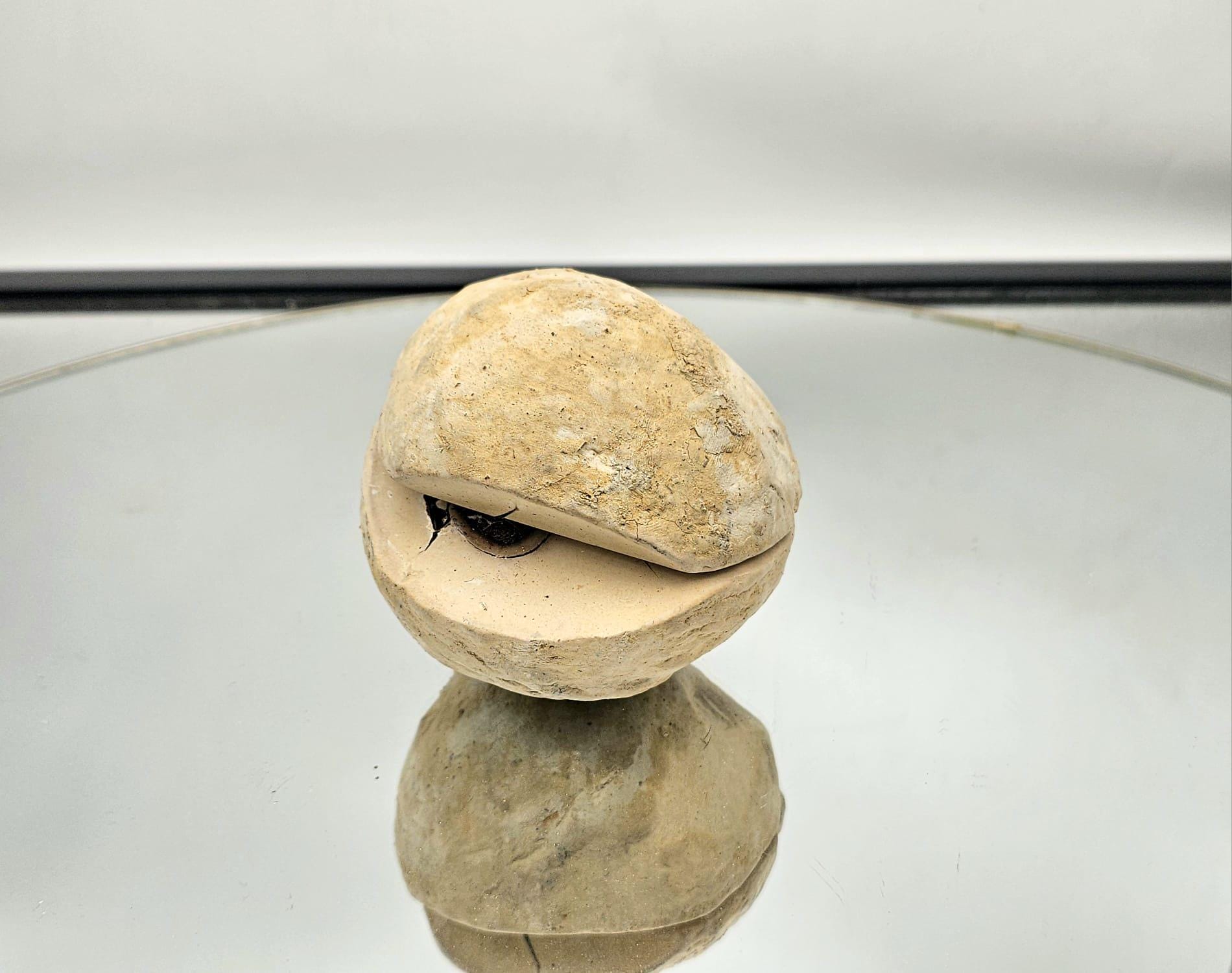 Large Septarian Geode pair with intricate crystal formations.