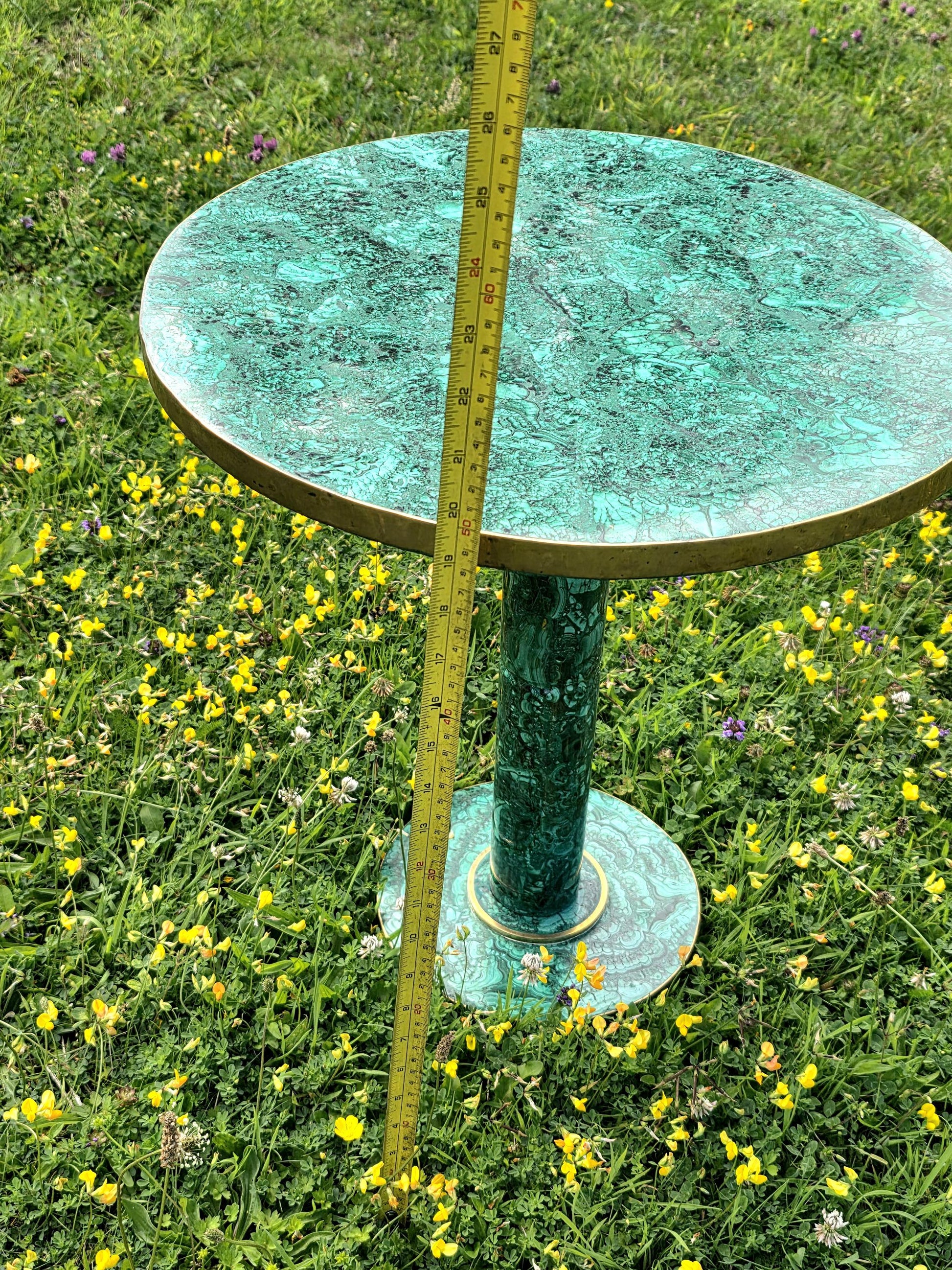 Statement crystal table with hand-finished malachite inlay and decorative brass accents.