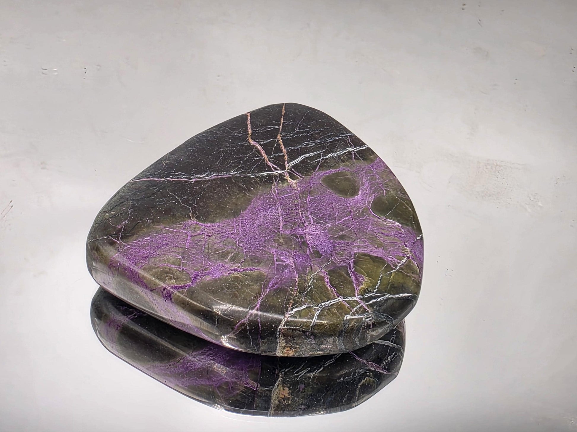 Solid crystal featuring stichtite and serpentine in one form.