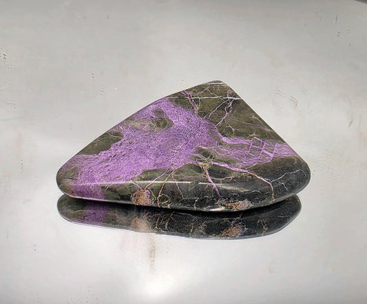 Polished palmstone made from stichtite and serpentine minerals